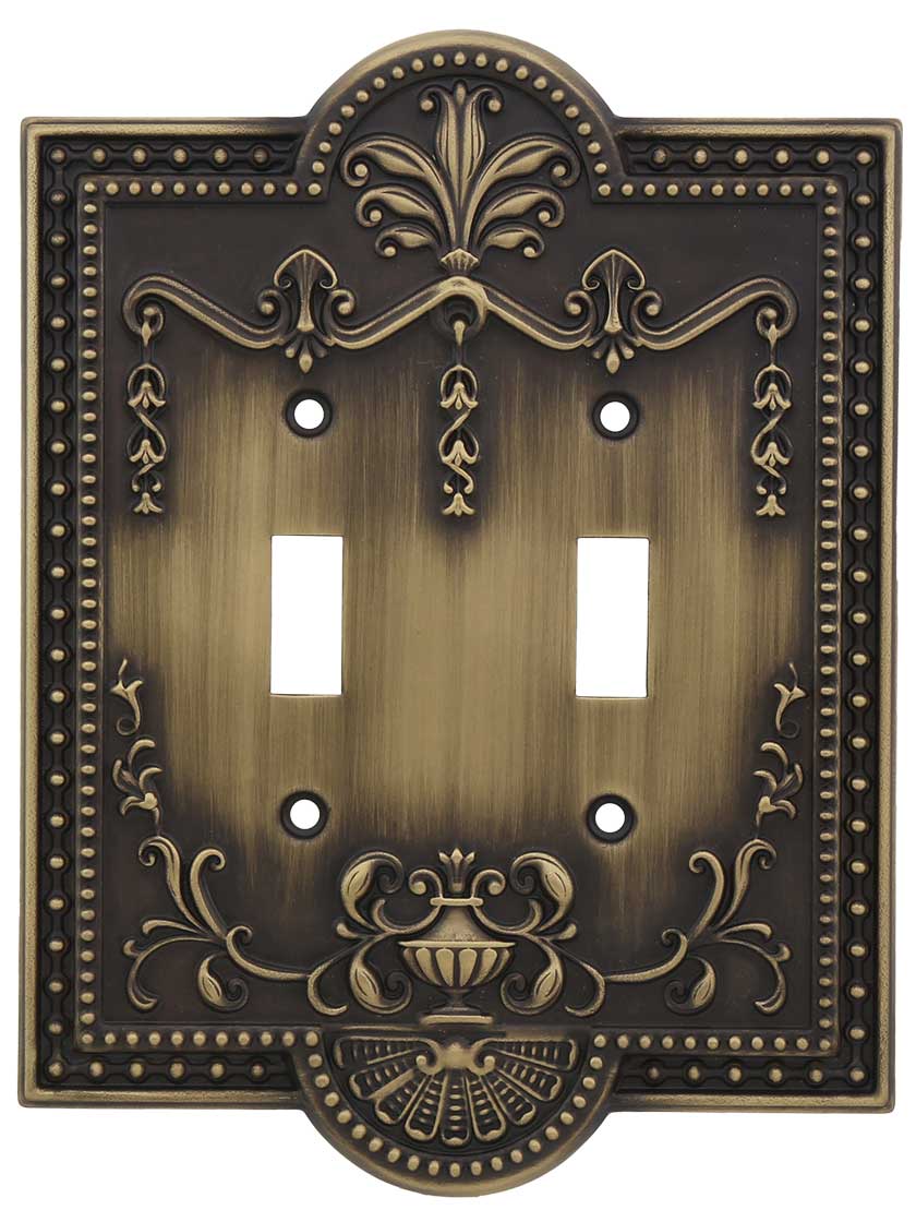 Como Double Toggle Switch Plate in Antique Brass.